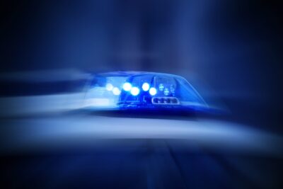 Police Car With Blue Lights Switched On